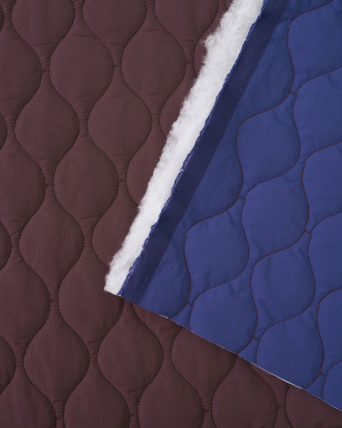 Fig Blue Wavy Quilted Puffy Nylon