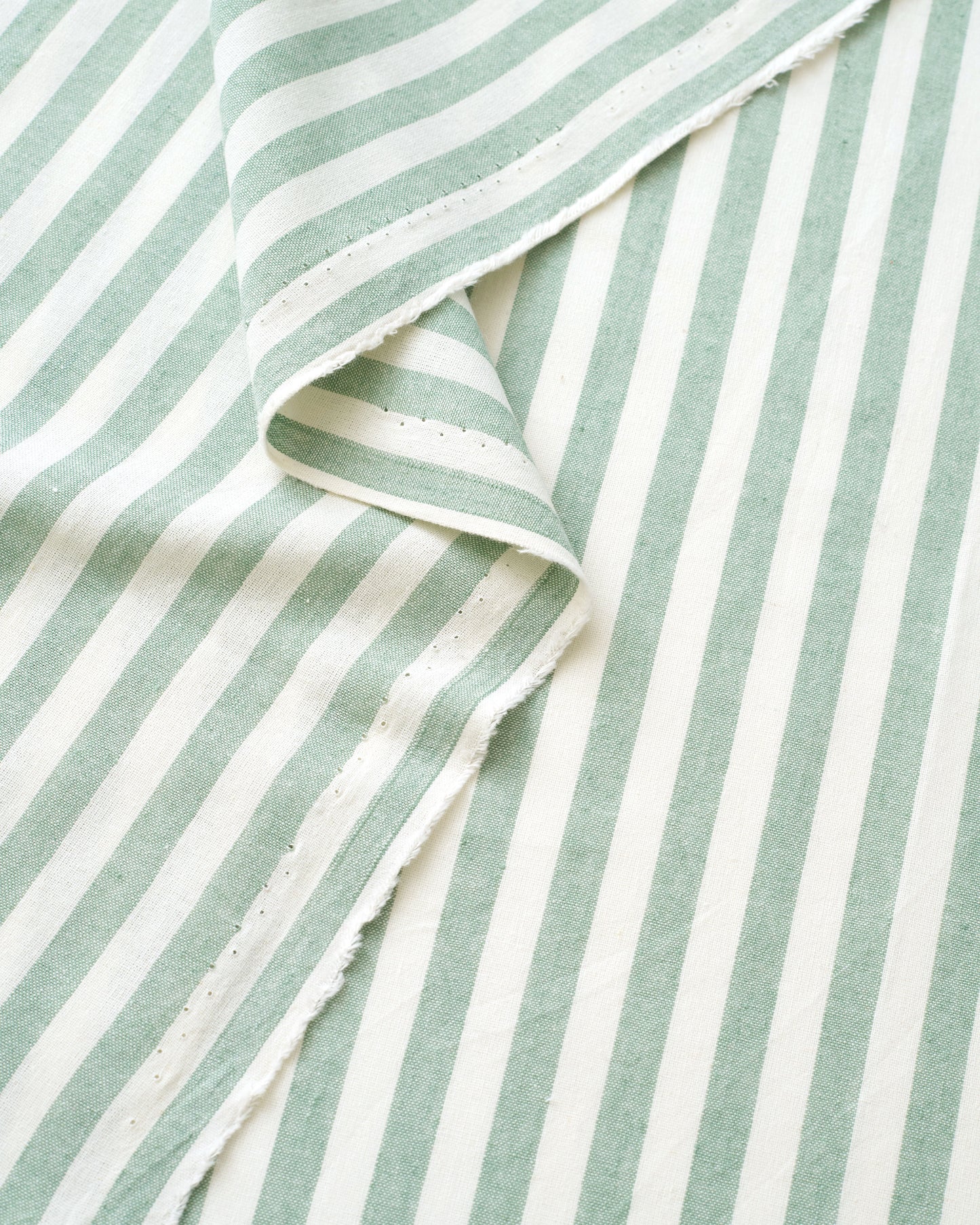 Close-up of green and white striped fabric